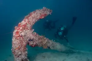 Assessing an 18th-century anchor from a shipwreck in Dry Tortugas National Park, Florida. 
