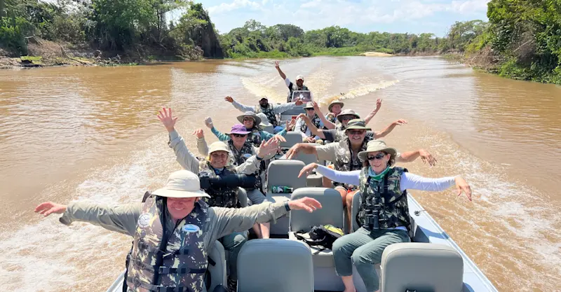 Nat Hab guests on private river cruise, Pantanal, Brazil.