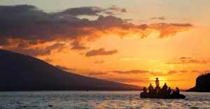 Zodiac cruise at sunset, Galapagos Islands, Ecuador.