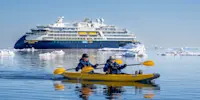 Guests kayaking, Svalbard, Norway..