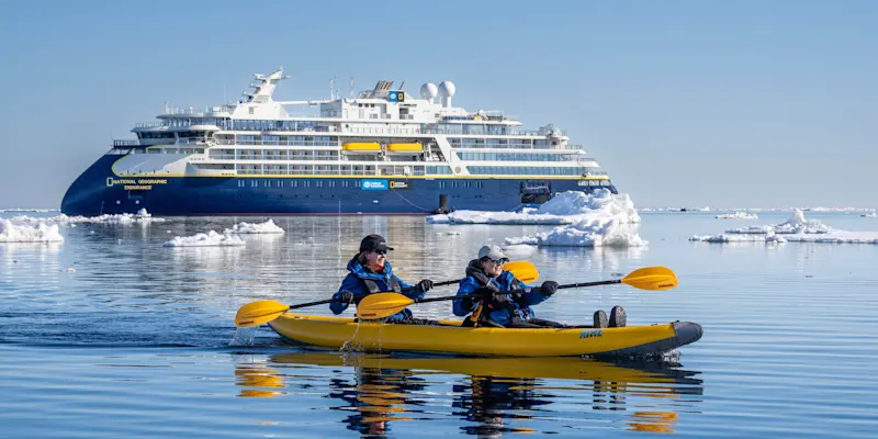 Guests kayaking, Svalbard, Norway..