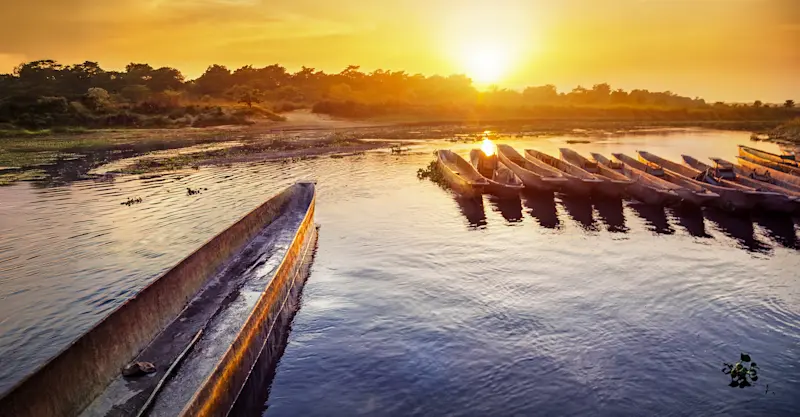 Canoes at Meghauli Serai safari lodge, Chitwan National Park, Nepal.