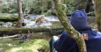 Nat Hab guest and spirit bear, Great Bear Rainforest, British Columbia.