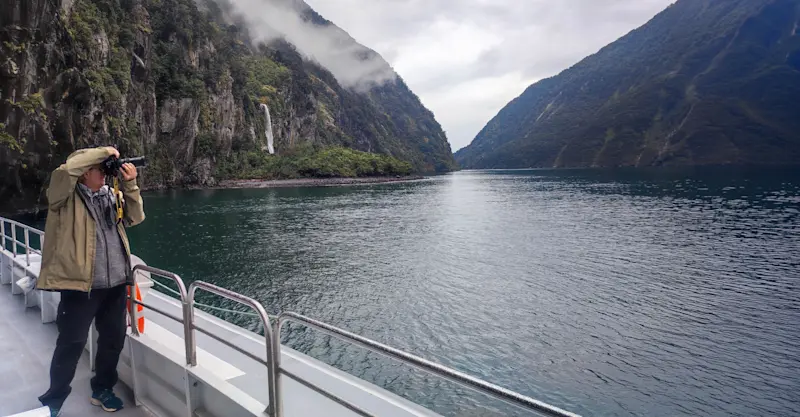 Photographer, Milford Sound, New Zealand.
