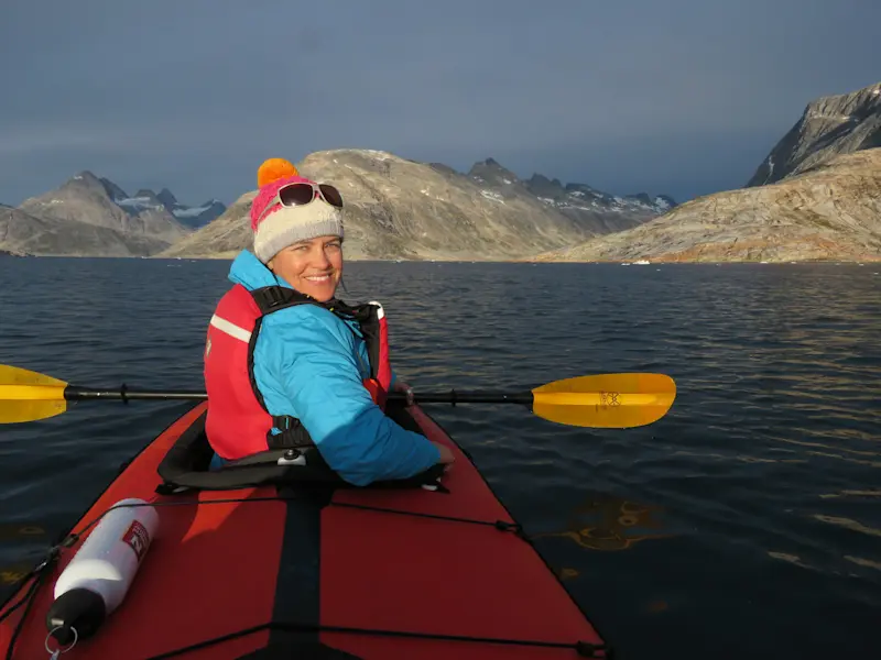 Kayaking with fin whales in Greenland.