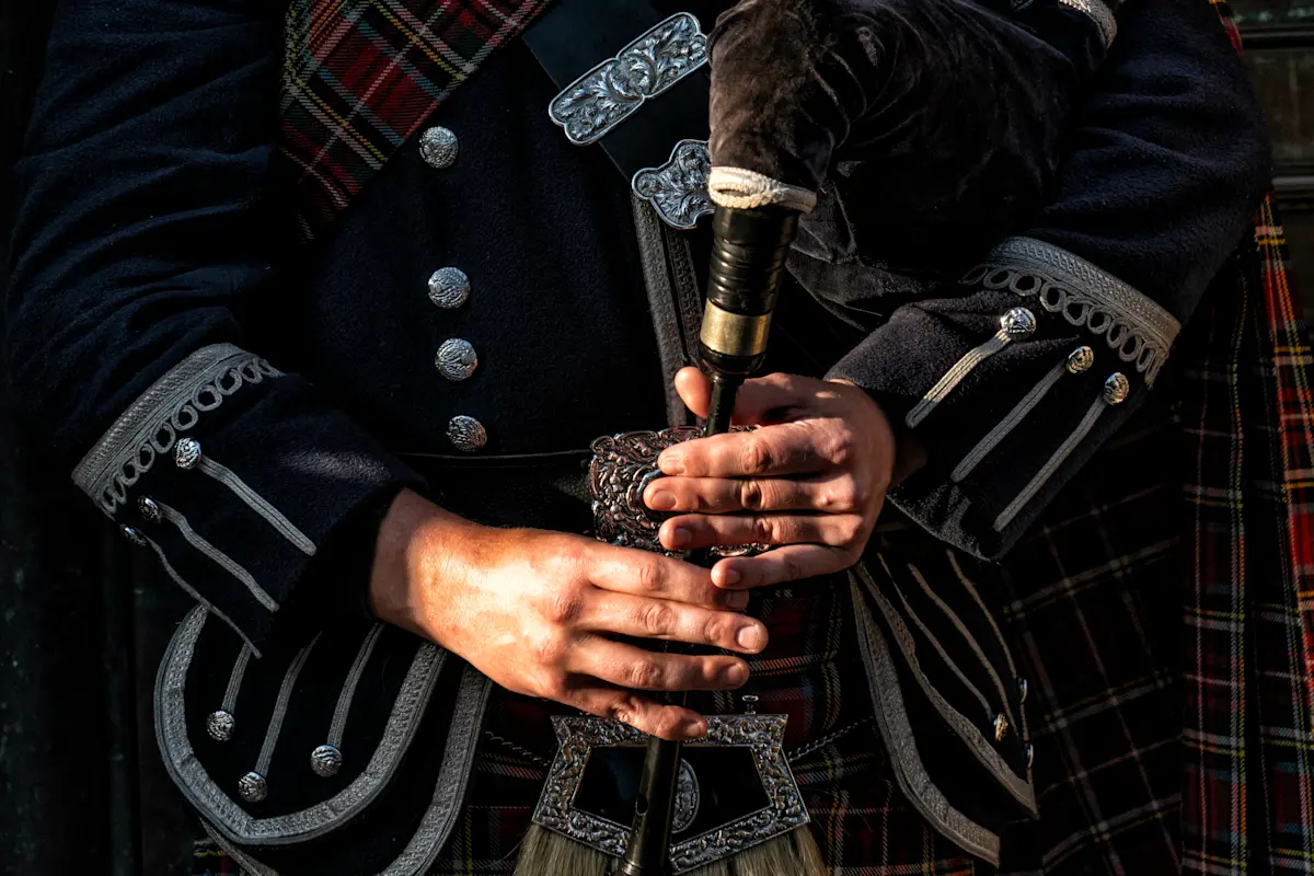 Bag piper, Scotland.