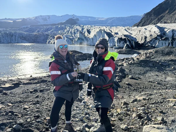 A champagne toast with an iceberg calving right behind us.