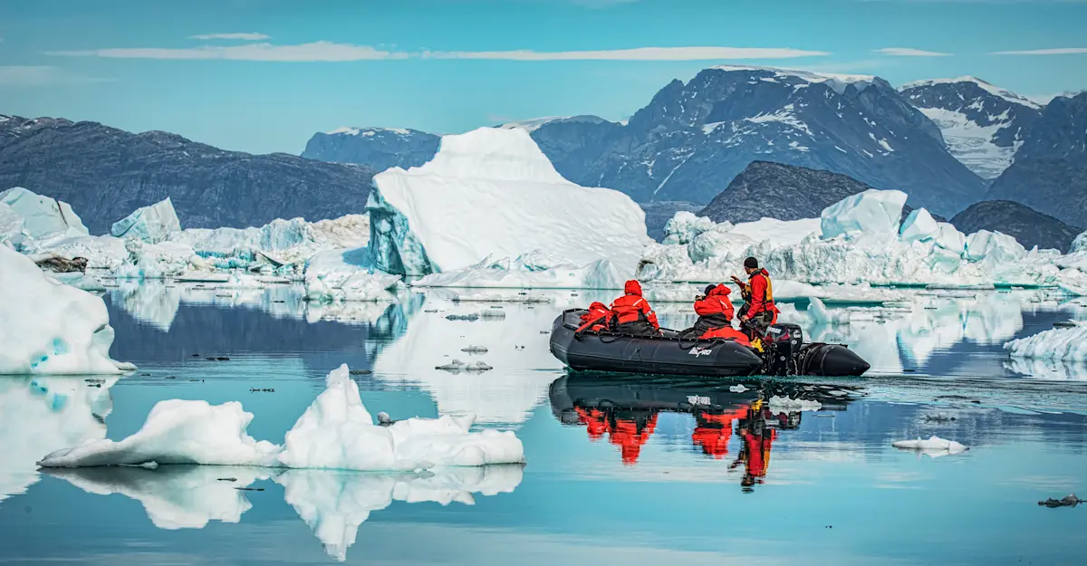 Nat Hab guests on Zodiac cruise, Sermilik Fjord, Greenland.