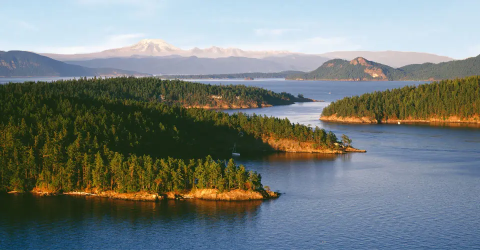 Orcas Island and Obstruction Pass with Mt. Baker in the distance, San Juan Islands, Washington.