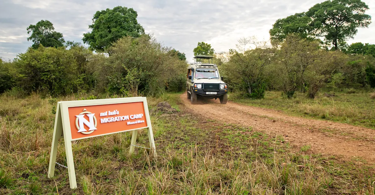 Safari vehicle at Nat Hab's Migration Camp—Maasai Mara