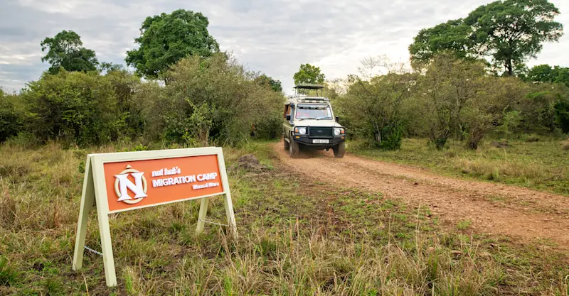 Safari vehicle at Nat Hab's Migration Camp—Maasai Mara