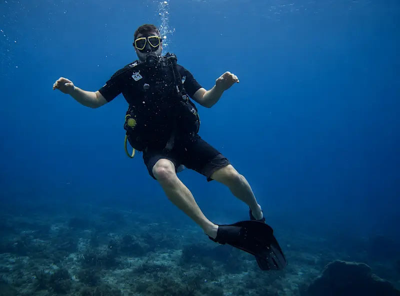 Kristopher scuba diving in the waters off Tobago.