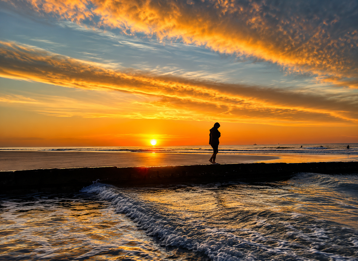 Soaking in the morning sunrise and waves back home in Wilmington, North Carolina.
