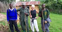 Nat Hab guest and local porters, Bwindi Impenetrable National Park, Uganda.