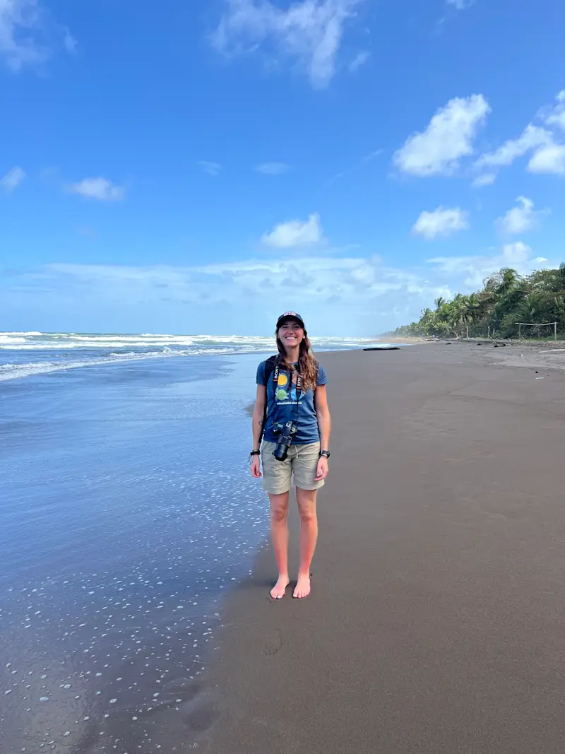 Smiling for a photo on Tortuguero beach in Costa Rica. 