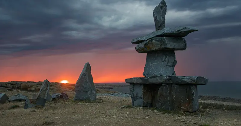 Inukshuk at sunset, Churchill, Manitoba.