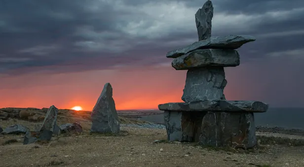 Inukshuk at sunset, Churchill, Manitoba.