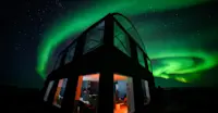 Northern lights viewing from Nat Hab's Boreal Lounge, Churchill, Manitoba, Canada.