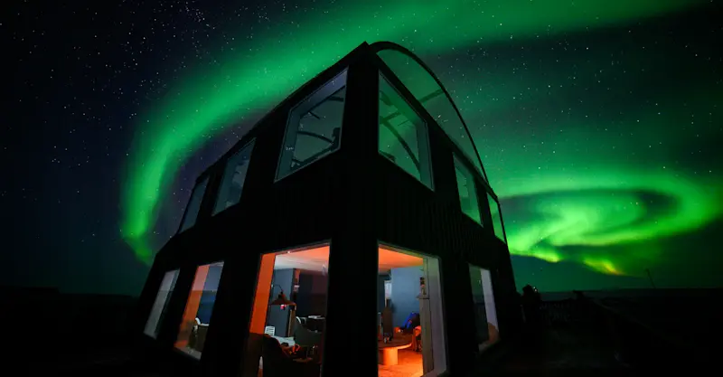 Northern lights viewing from Nat Hab's Boreal Lounge, Churchill, Manitoba, Canada.