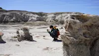 Photographing unusual rock formations in the Bisti/De-Na-Zin Wilderness, New Mexico.