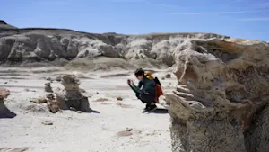 Photographing unusual rock formations in the Bisti/De-Na-Zin Wilderness, New Mexico.