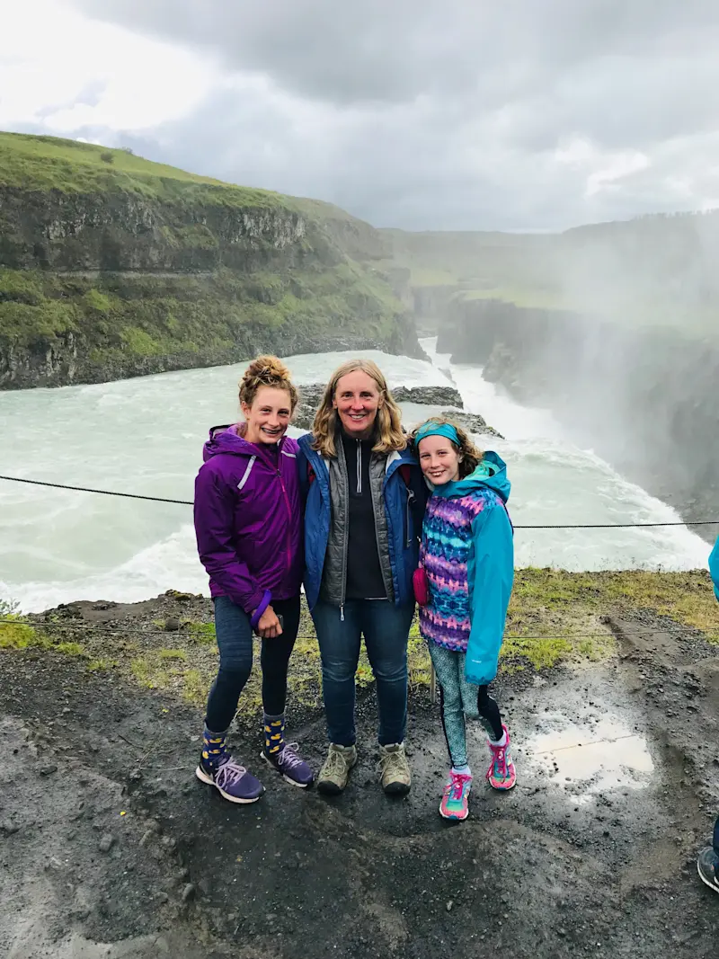 Taking in the power of a cascading waterfall in Iceland.