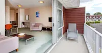 Guest room with balcony views