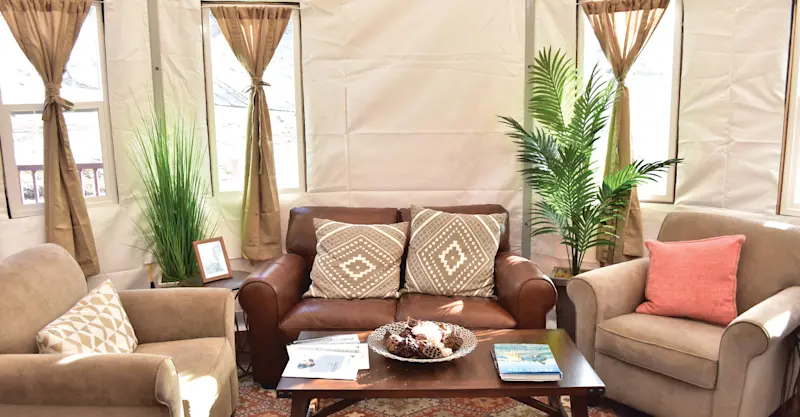 Sitting area inside tent at Nat Hab's Base Camp Greenland