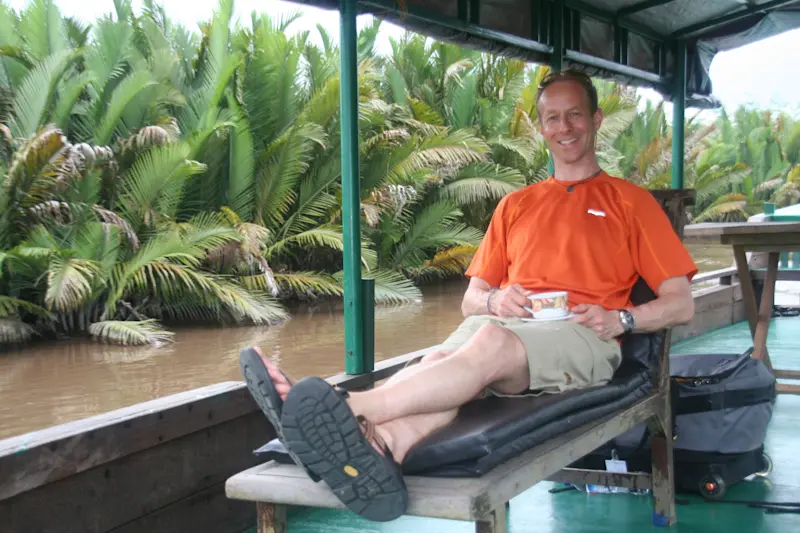 Kicking back on the river enroute to the orangutans in Tanjung Puting National Park, Indonesian Borneo.