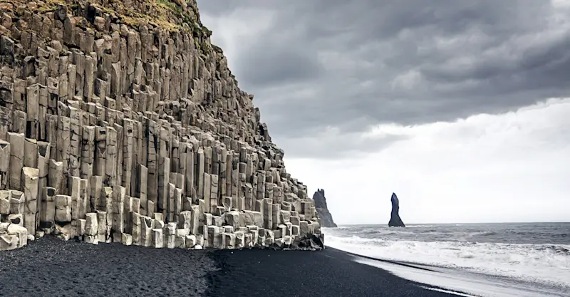 Black sand beach and basalt columns, Reynisfjara, Iceland.	