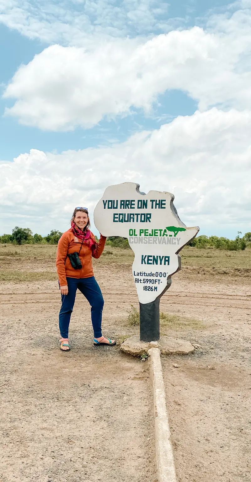 Standing on the equator in Ol Pejeta Conservancy in Kenya.