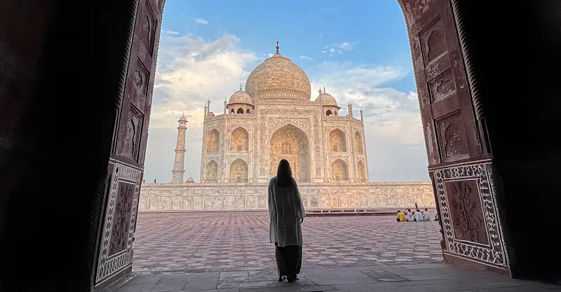 Standing in awe before a timeless symbol of love at the Taj Mahal in Agra, India.