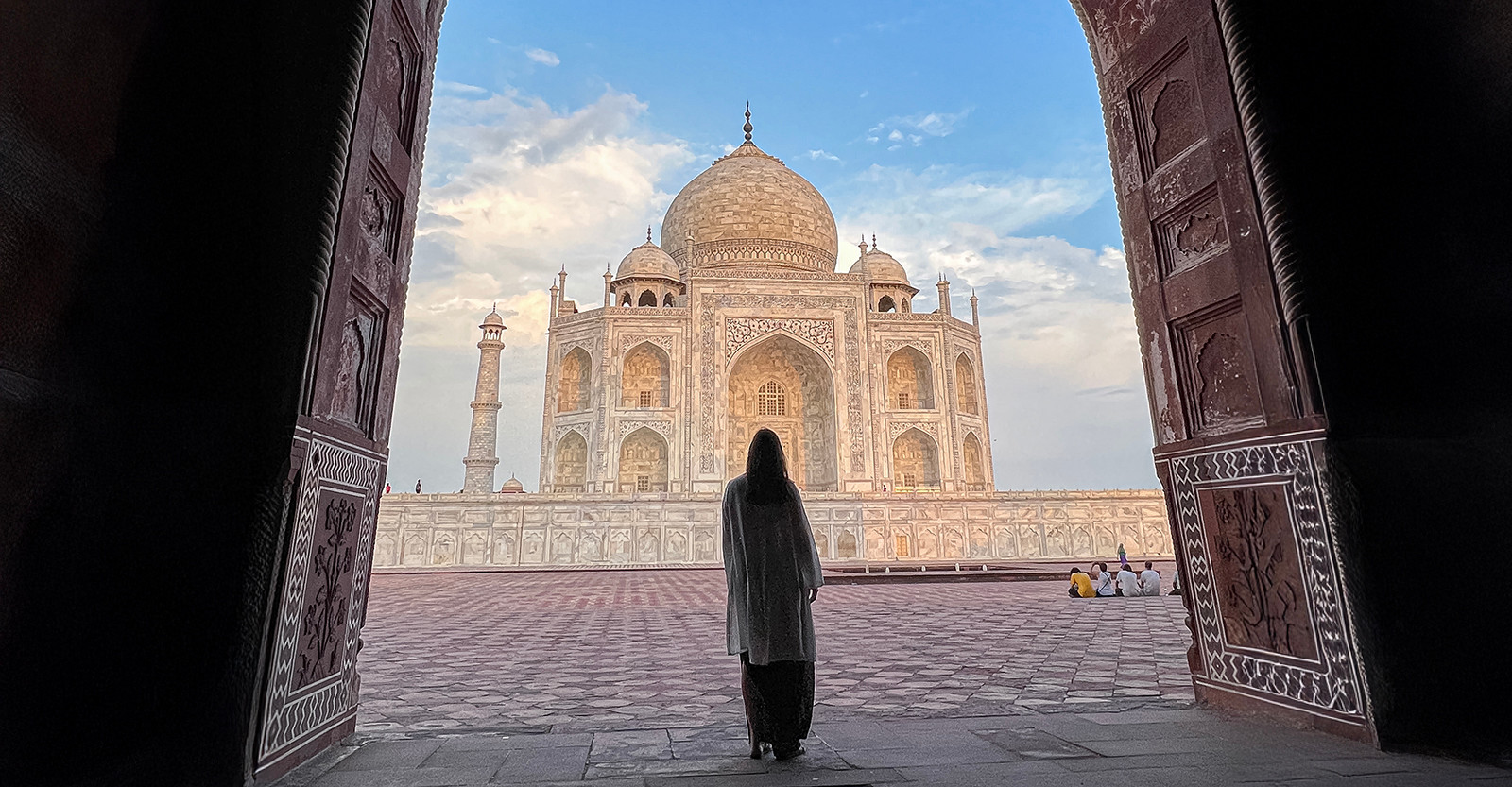 Standing in awe before a timeless symbol of love at the Taj Mahal in Agra, India.