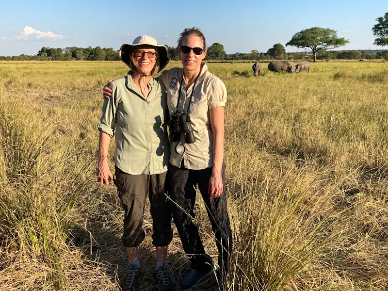 My aunt and I hanging out with rhinos in Botswana