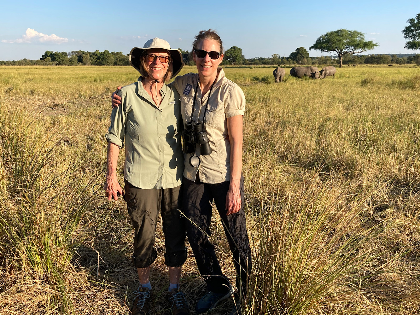 My aunt and I hanging out with rhinos in Botswana