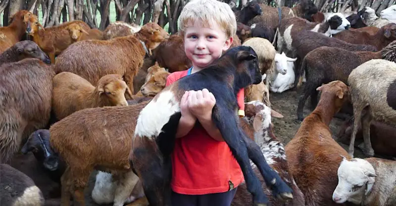 Nat Hab guest visiting Maasai village, Siana Private Conservancy, Kenya.