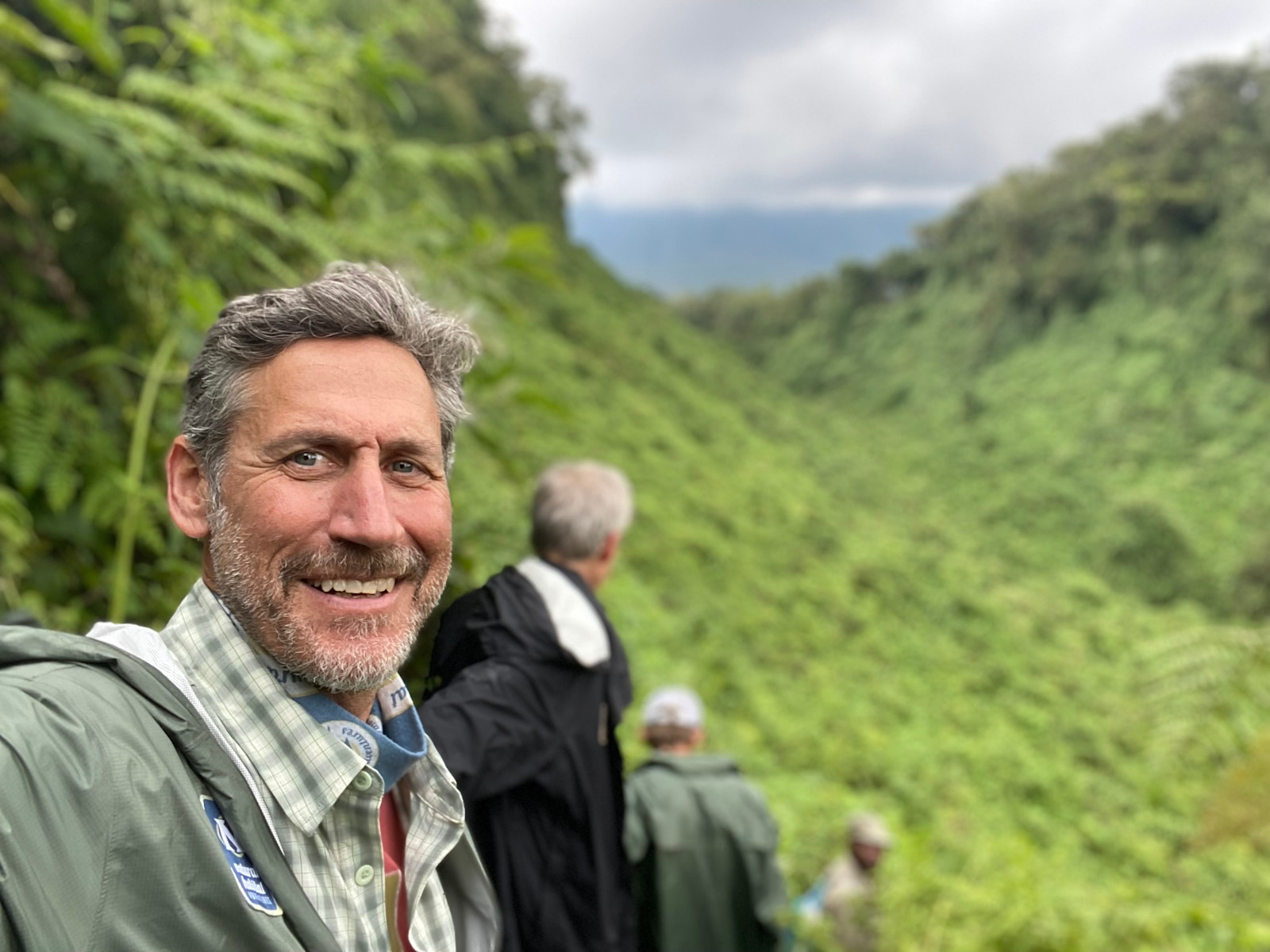 Trekking through the mountain with gorillas in Rwanda.
