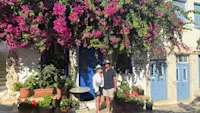 Wandering sunlit streets on the island of Tinos, Greece.