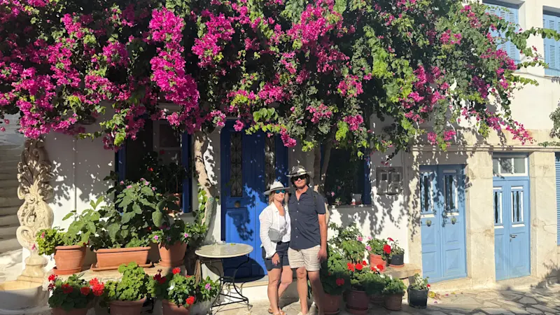 Wandering sunlit streets on the island of Tinos, Greece.