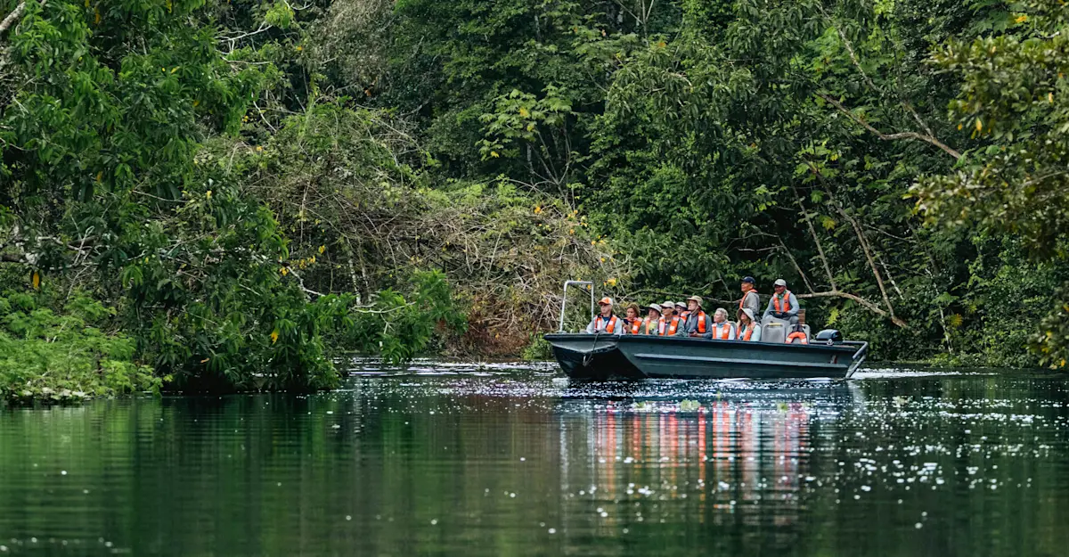 Earthwatch Expeditions guests observe wildlife, Amazon, Peru.