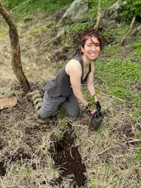 Planting shrubs in a restoration plot on an Earthwatch expedition in Costa Rica.  