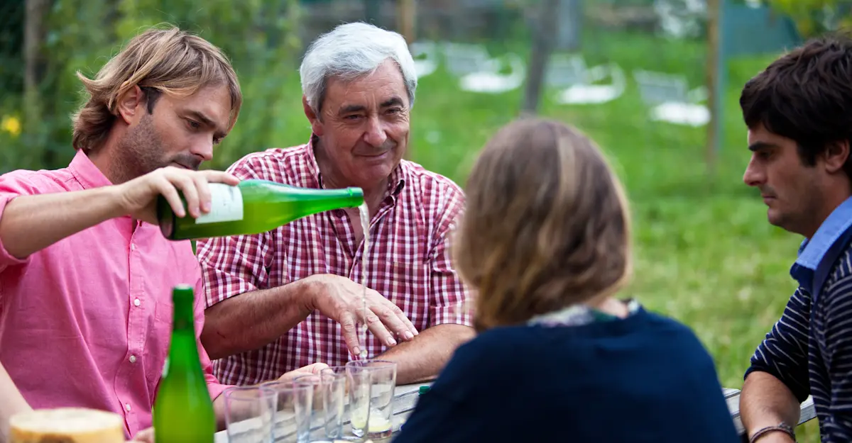 - Guests enjoy traditional Txakoli wine at a farmhouse in Basque, Spain