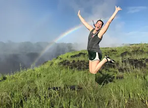 Jumping for joy at Victoria falls in Zambia. 