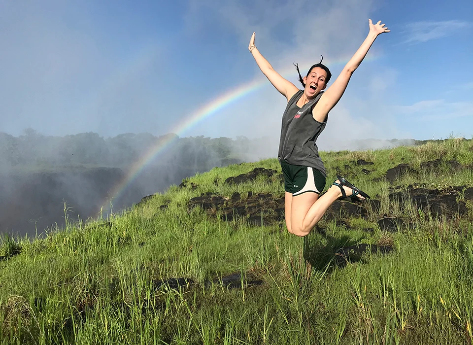 Jumping for joy at Victoria falls in Zambia. 