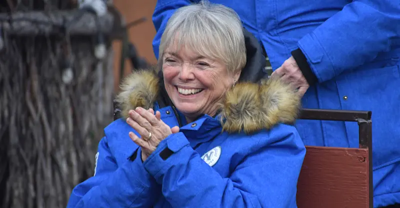 Nat Hab guest on dog sled, Churchill, Manitoba.