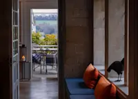 View from interior lounge to outdoor patio