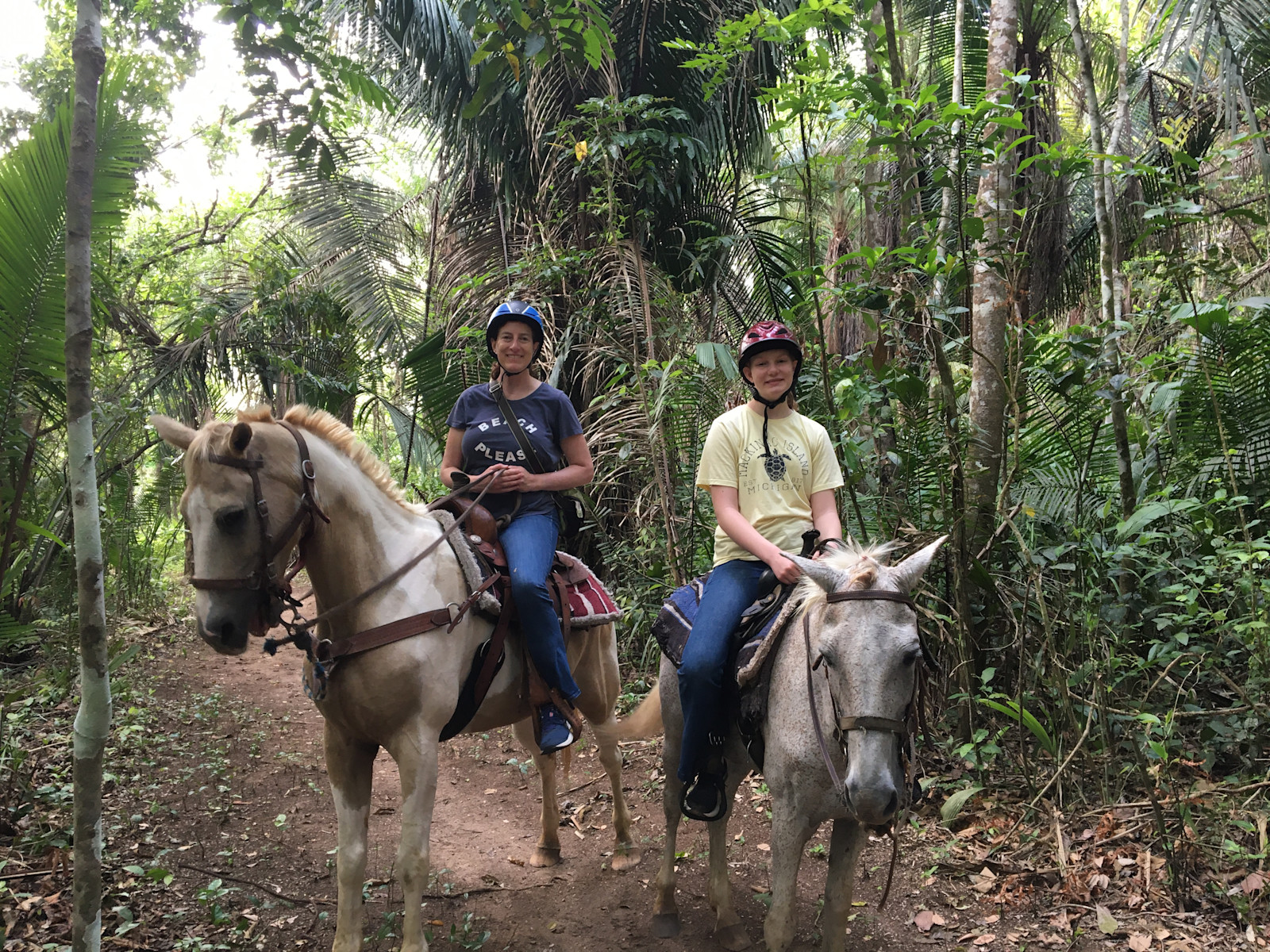 Horseback riding in Belize. 