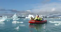 Nat Hab guests on private zodiac tour at Fjallsarlon Glacier Lagoon, Iceland.