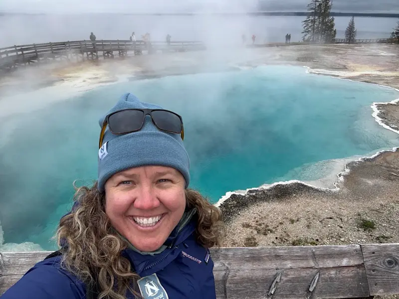 Hiking among the hot springs and geysers in Yellowstone, Wyoming.