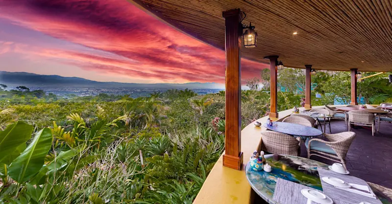 Terrace dining with a sunset view